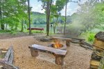 Fire pit area near the lake Canoe is not included in rental